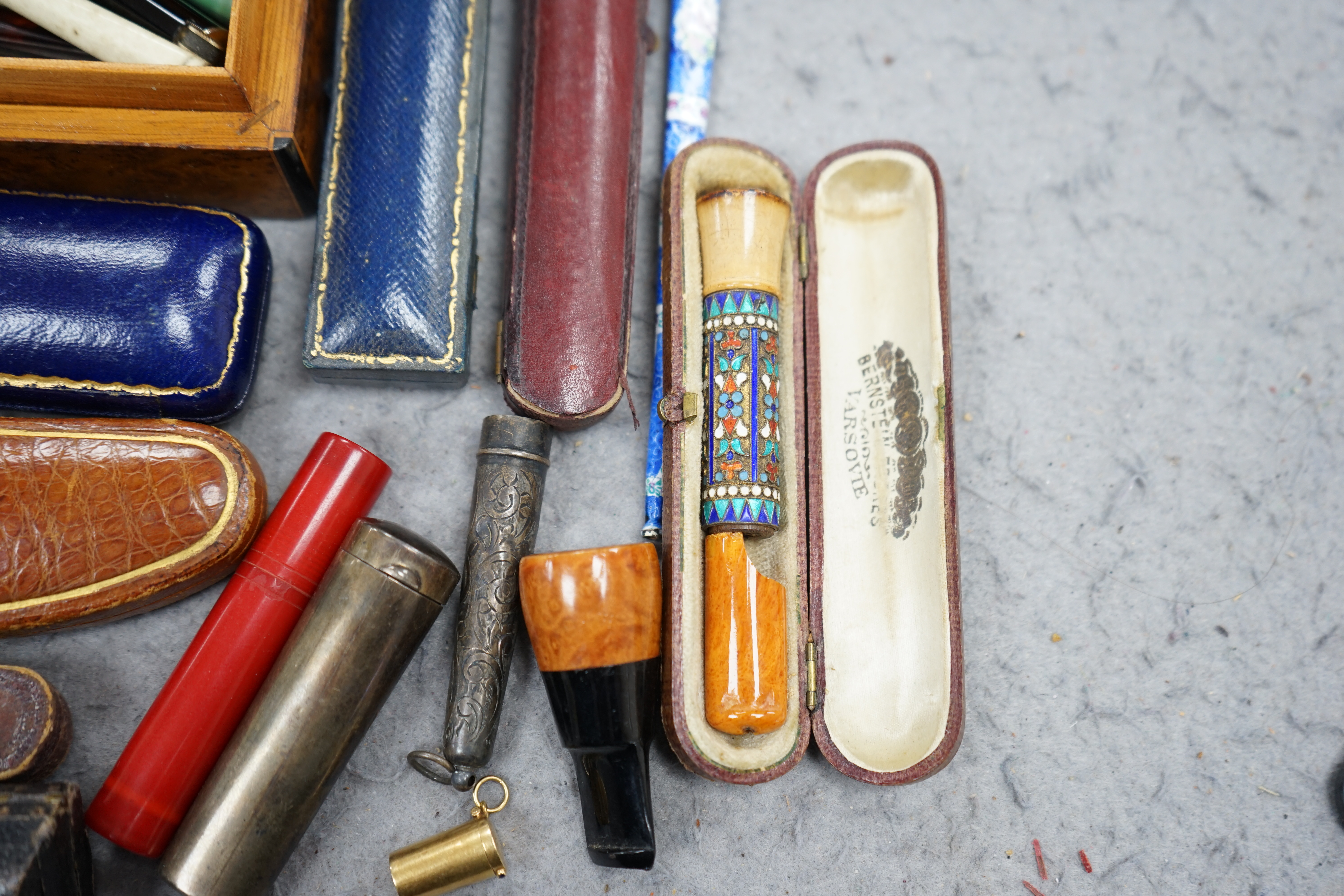 A group of assorted cigar and cheroot cigarette holders, some cased. Condition - fair